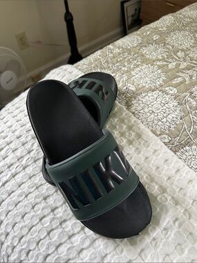 Nike Black and Dark Green Slide Sandals with Raised Logo